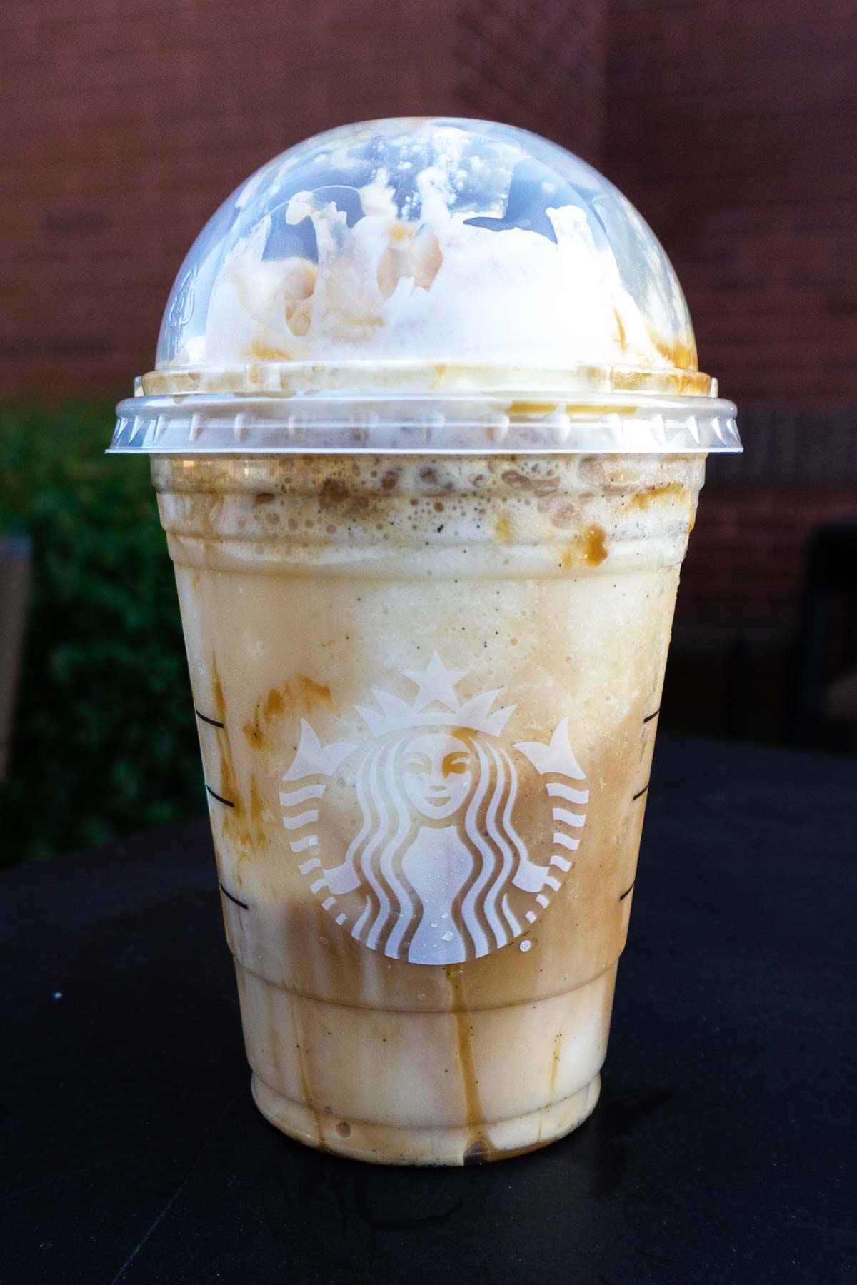 i want some over the top frozen caramel macchiato frappuccino little treat because im a worthless faggot