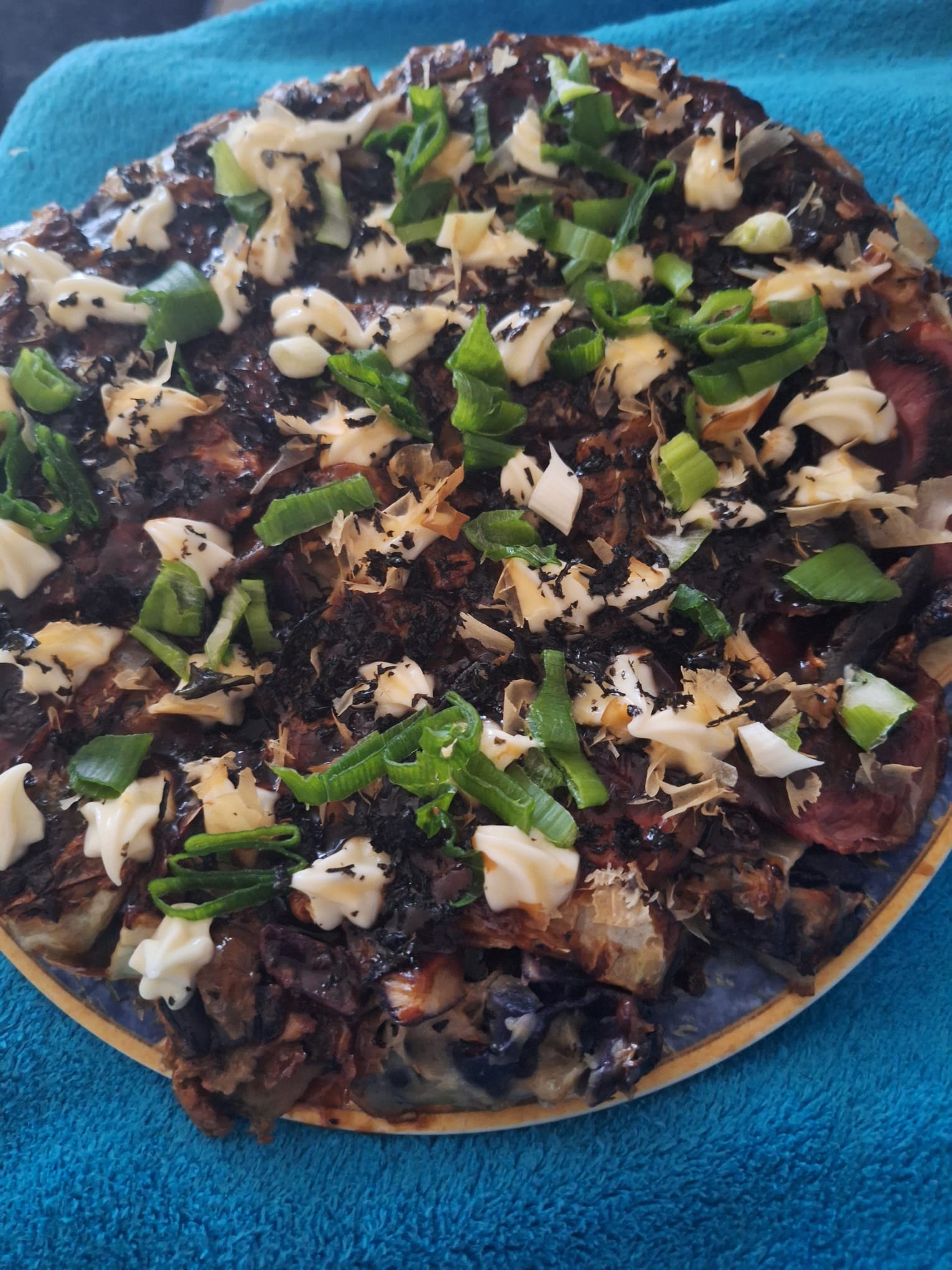 Okonomiyaki of the day. Special ingredients this time: bologna sausage, smoked duck breast cold cuts pan fried & chili pepper (唐辛子)